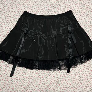 Glistening Black Skirt with Lace Trim